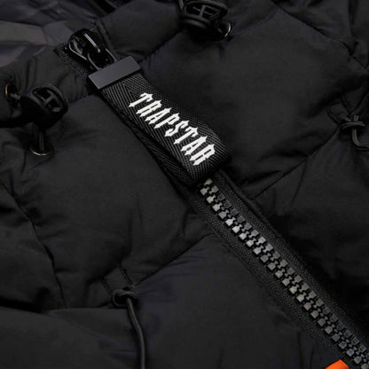 TRAPSTAR IRONGATE ARCH PIPING PUFFER JACKET - BLACK / ORANGE