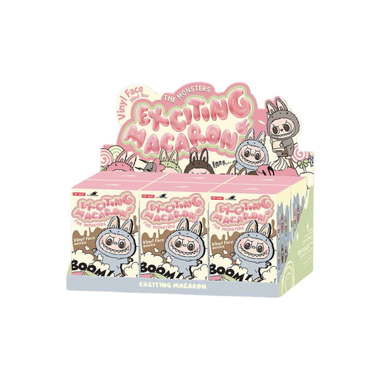 Full display case of Labubu 'Exciting Macaron' vinyl face blind box series by Pop Mart, featuring themed packaging artwork and BOOM! design.