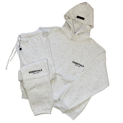 FEAR OF GOD ESSENTIALS LIGHT HEATHER OATMEAL TRACKSUIT (SS22)