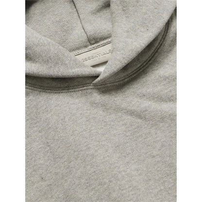 FEAR OF GOD ESSENTIALS KIDS DARK HEATHER OATMEAL HOODIE (SS22) - Hype Locker UK