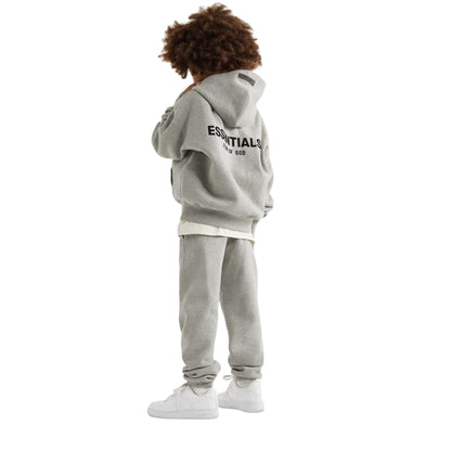 FEAR OF GOD ESSENTIALS KIDS DARK HEATHER OATMEAL HOODIE (SS22) - Hype Locker UK